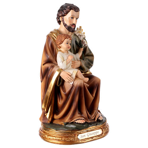 St Joseph sitting with Jesus Child, painted resin statue of 8 in 4