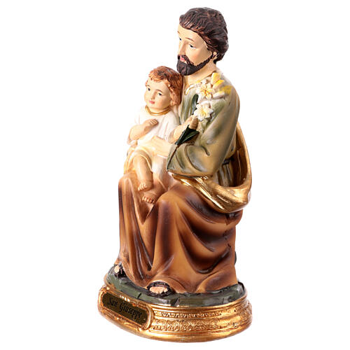 Heiliger Josef, sitzend, mit Jesuskind und Lilie, aus farbig gefassten Resin, 15 cm 2