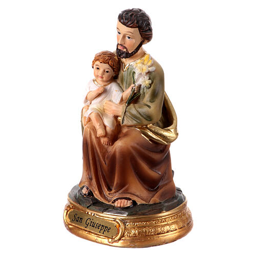 Statue of St Joseph sitting with Jesus Child, painted resin, 4 in 2