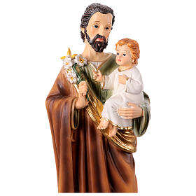 St Joseph with Infant Jesus and lily, painted resin statue of 12 in