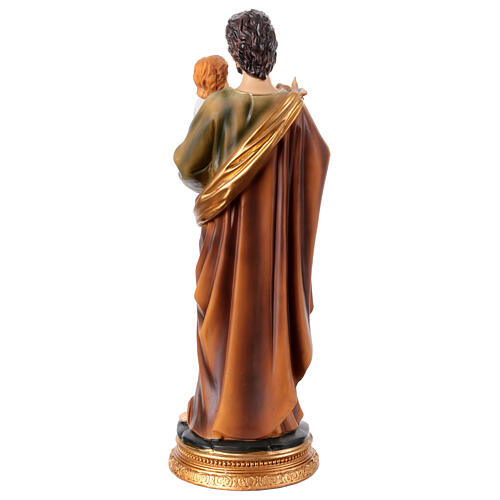 St Joseph with Infant Jesus and lily, painted resin statue of 12 in 5