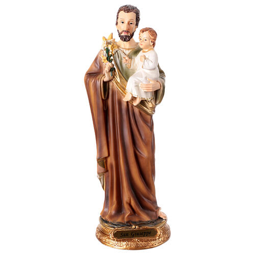 St Joseph with lily and Infant Jesus, painted resin, 10 in 1