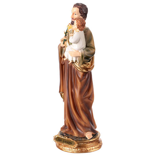 St Joseph with lily and Infant Jesus, painted resin, 10 in 3