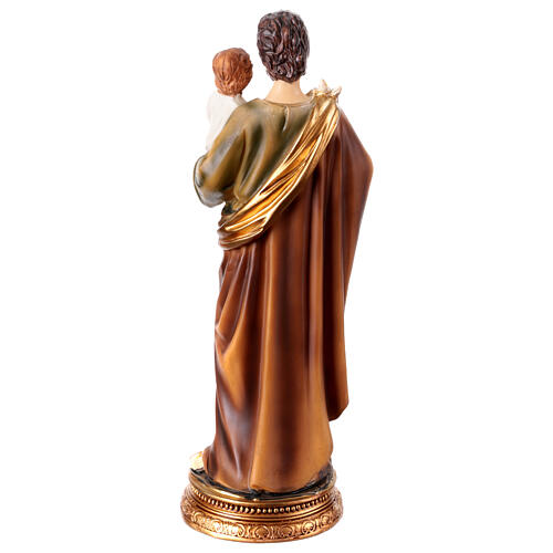 St Joseph with lily and Infant Jesus, painted resin, 10 in 5