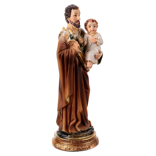 Heiliger Josef, stehend, mit Jesuskind und Lilie, aus farbig gefassten Resin, 10 cm 3