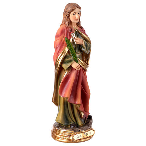 St Agatha with martyr's palm and pincers, painted resin figurine, 8 in 4