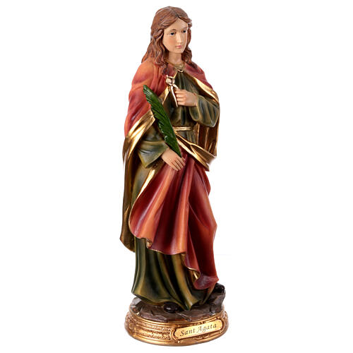 Statue of St Agatha with pincers and palm, painted resin, 12 in 4