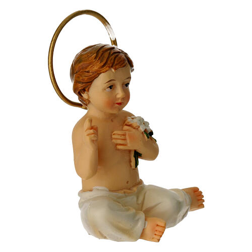 Sitting Infant Jesus, painted resin, 2.2 in 3