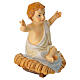 Infant Jesus sitting in the manger, h 3 in, resin s3