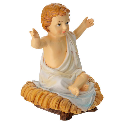 Bambinello seduto sulla mangiatoia statua resina h reale 10 cm 2