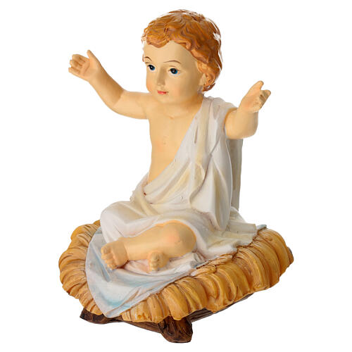Bambinello seduto sulla mangiatoia statua resina h reale 10 cm 3