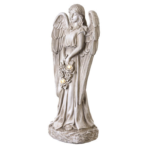 Ángel con rosas para exterior luz solar 50 cm color marfil 2