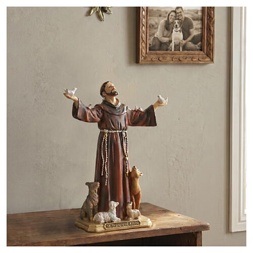 St. Francis of Assisi surrounded by animals, painted resin, 8 in 2