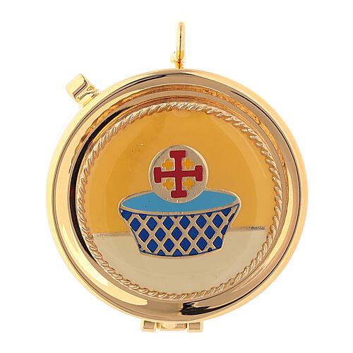 Pyx with Cross in a basket on yellow background 1