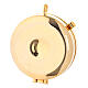 Pyx with Cross in a basket on yellow background s3