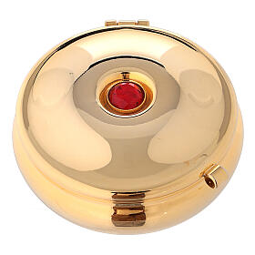 Gold plated pyx with red stone and red burse
