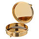 Golden burse with white decorations and a 2 in pyx s4