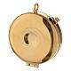 Golden burse with white decorations and a 2 in pyx s5