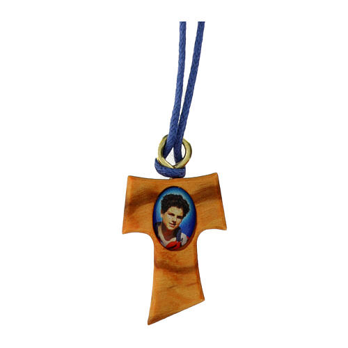 Cross-shaped pendant, olivewood tau with Carlo Acutis' image, blue rope 1