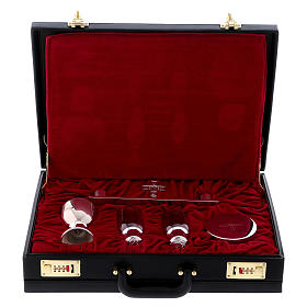 Molina celebration case with objects in silver brass