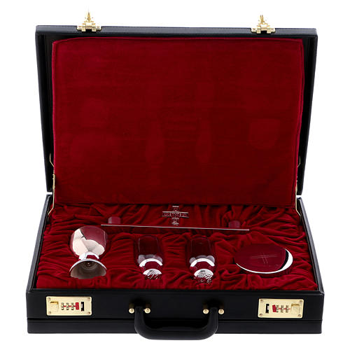 Molina celebration case with objects in silver brass 1