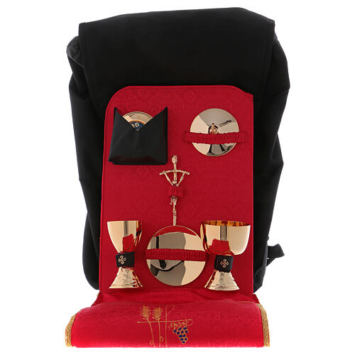 Travel mass kit with industrial textile backpack and red satin lining ...