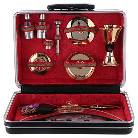 Mass kit in plastic case with metal and leather insets red satin lining