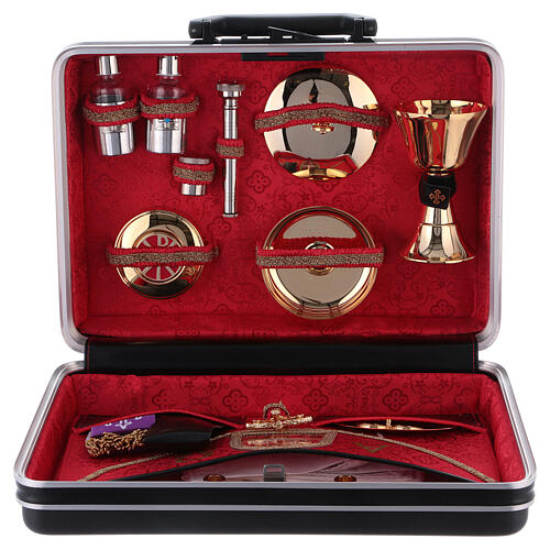 Mass kit in plastic case with metal and leather insets red satin lining 1