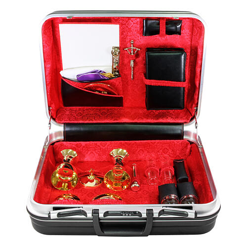 Mass kit with suitcase in plastic and metal, lined with red satin 1
