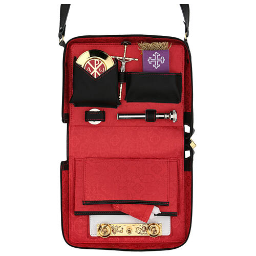 Leather shoulder bag with red Jacquard lining and travel mass kit 1