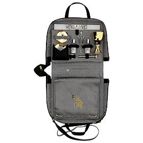 Leather handbag with shoulder belt, travel mass kit
