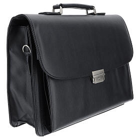 Black briefcase with red Jacquard lining and travel mass kit