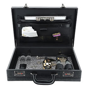 Black briefcase with grey fabric lining and travel mass kit