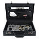 Black briefcase with grey fabric lining and travel mass kit s1
