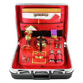 Suitcase for mass celebration in black abs with red interior