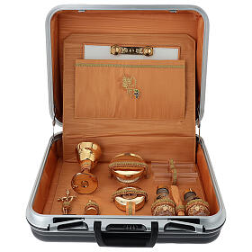 Celebration case with orange interior and Chi-Rho embroidery