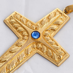Pectoral cross in chiselled gold-plated copper with blue stone