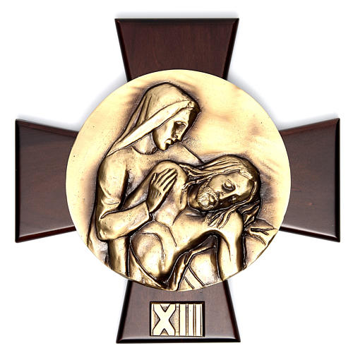 14 Stations of the cross in brass and wood. 13